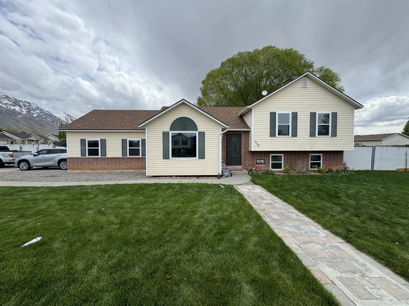 Window replacement on a brick and siding home